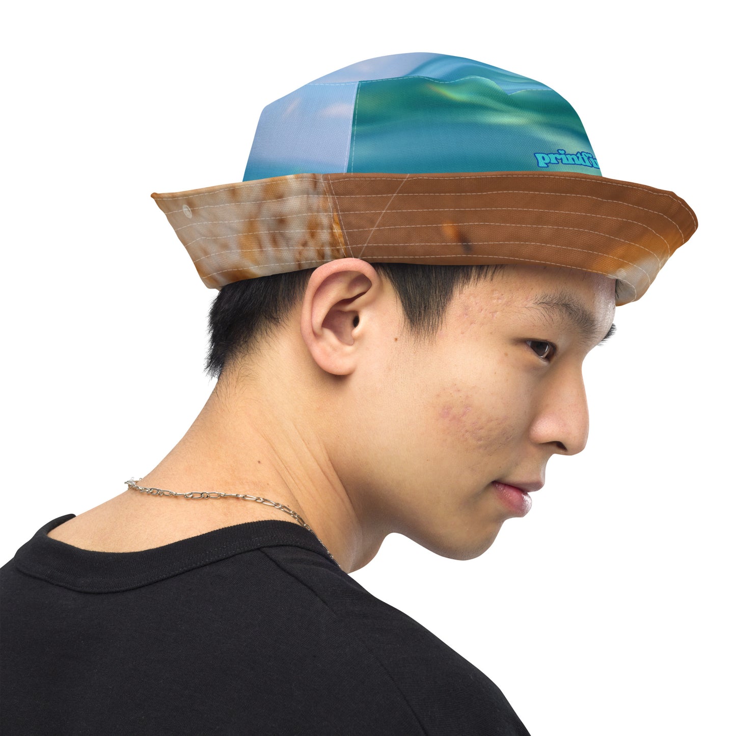 BABY SEA TURTLE/OCEAN REFECTION Reversible bucket hat